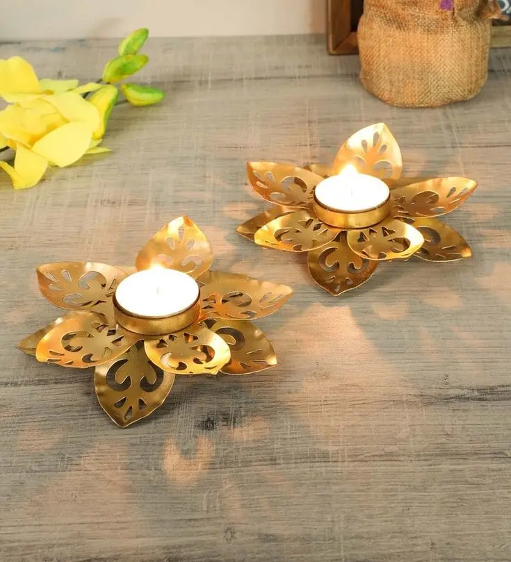 Table Tea Light Holder - Small Flower Cut Lotus Gold Metal Table Tea Light Holder Set of 2 by The Craze by Amaya Decors - Pepperfry.webp