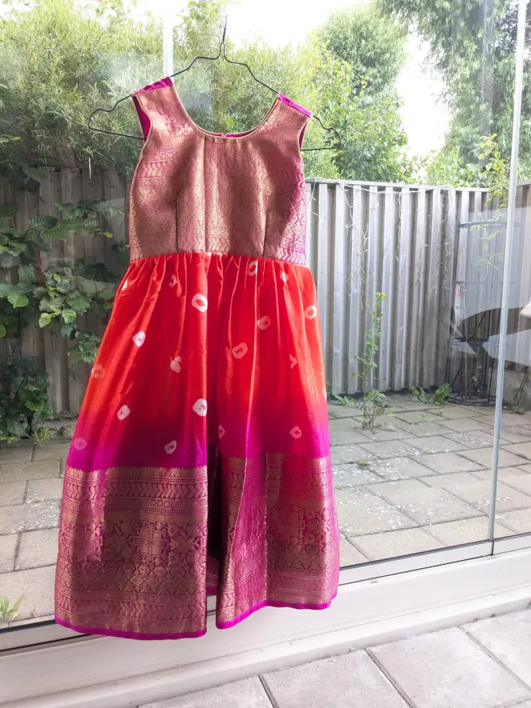 Dhriti Girls Orange Designer Printed Bandhani Girls Gown